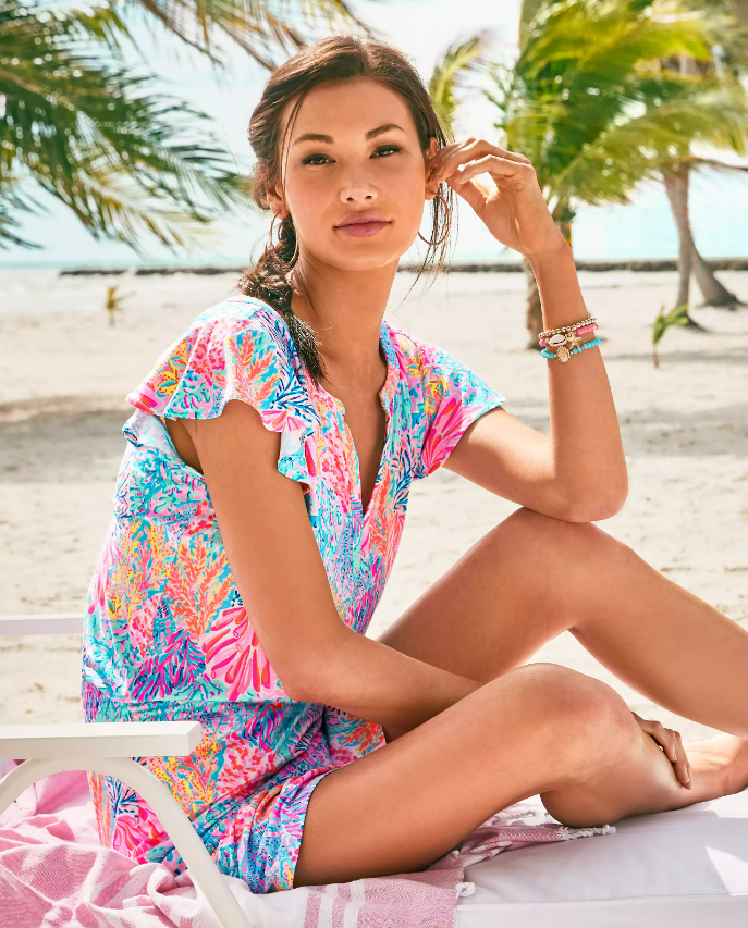Image of woman wearing a Lilly Pulitzer Romper on the beach