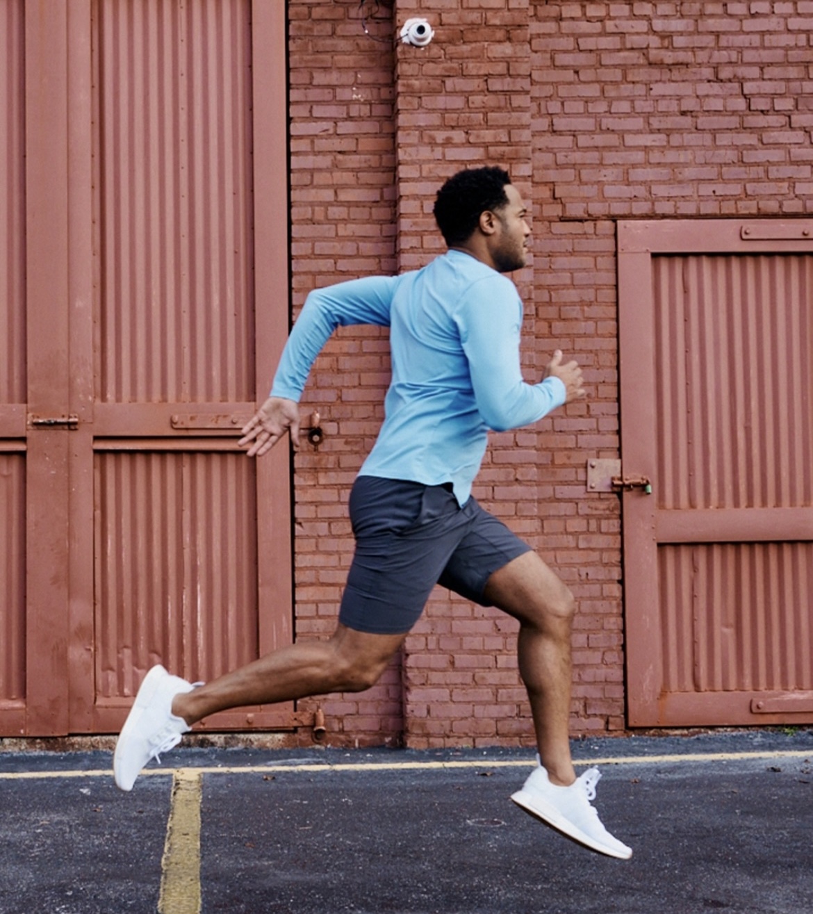 A lifestyle image from TASC Performance showing a man jogging. 