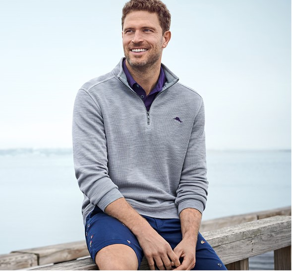 IMage of a man wearing Tommy Bahama 1/4 zip pullover and shorts